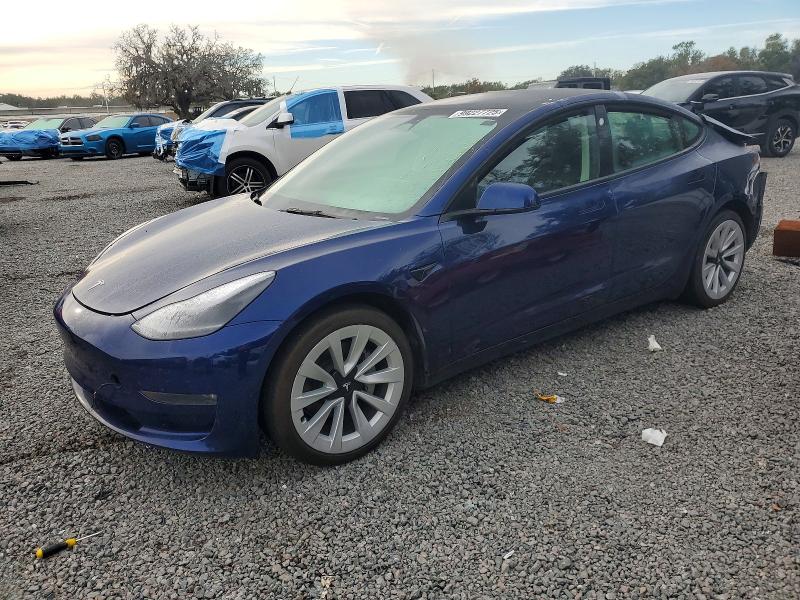 TESLA MODEL 3 2022 with VIN 5YJ3E1EB0NF336643 - Photo from auction