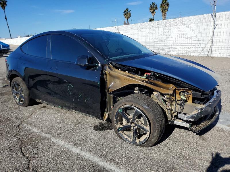 Photo 4 from auction – 2026 TESLA MODEL Y with VIN 7SAYGDED2TF380193