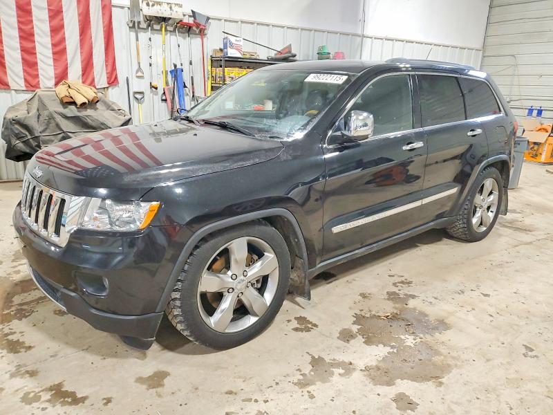 JEEP GRAND CHEROKEE 2011 with VIN 1J4RR6GT6BC536737 - Photo from auction
