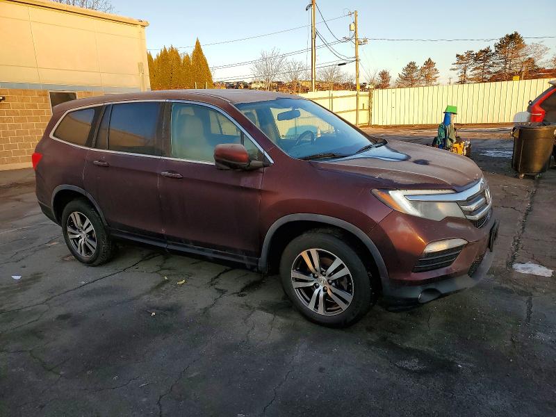 Photo 4 from auction – 2016 HONDA PILOT EXL with VIN 5FNYF6H59GB111145