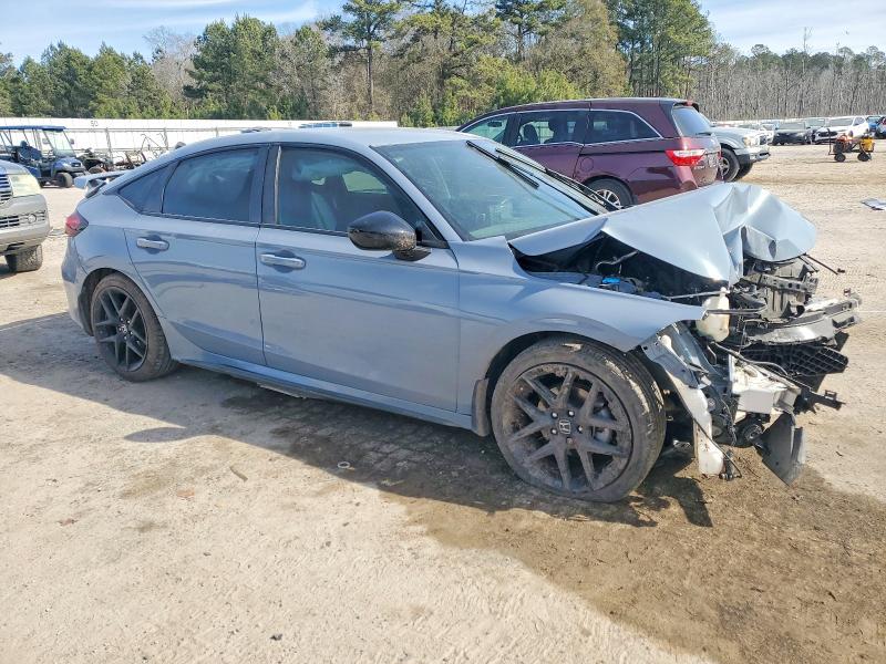 Photo 4 from auction – 2022 HONDA CIVIC SPOR with VIN 19XFL2H89NE020396