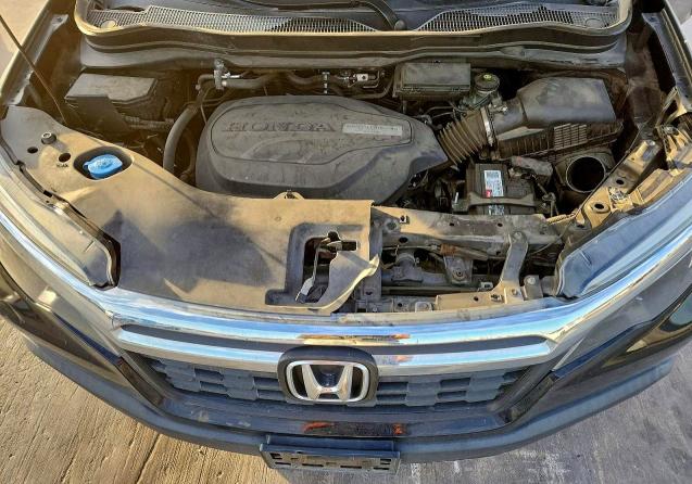 Photo 11 from auction – 2019 HONDA RIDGELINE with VIN 5FPYK2F57KB007373