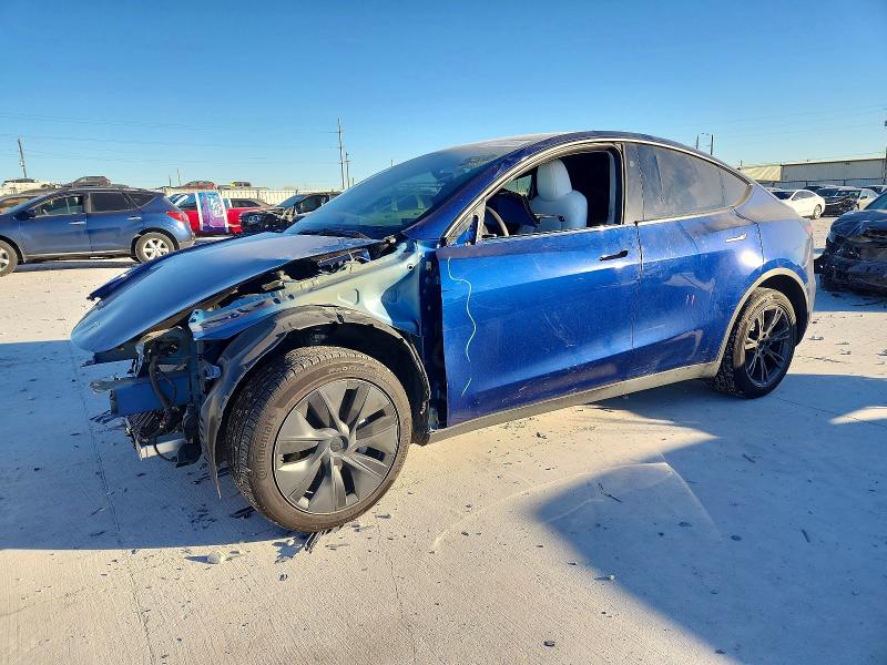 TESLA MODEL Y 2024 with VIN 7SAYGDED9RF114016 - Photo from auction
