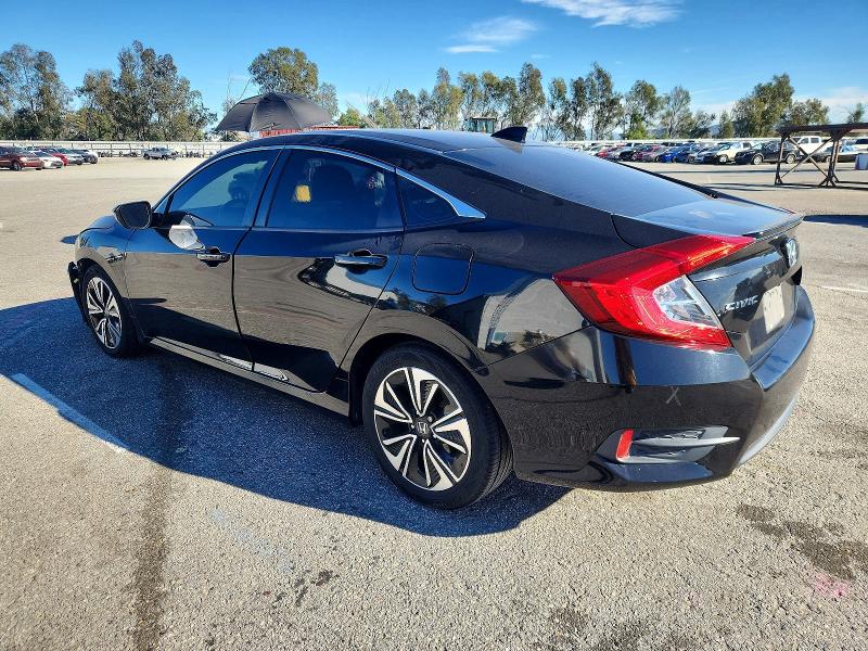 Photo 2 from auction – 2017 HONDA CIVIC with VIN 2HGFC1F76HH659396