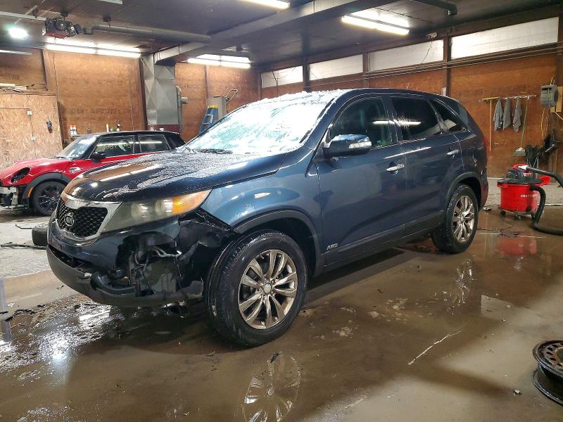 KIA SORENTO EX 2011 with VIN 5XYKUDA26BG004877 - Photo from auction