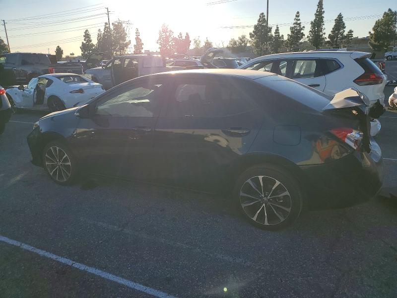 Photo 2 from auction – 2017 TOYOTA COROLLA L with VIN 5YFBURHE0HP711510