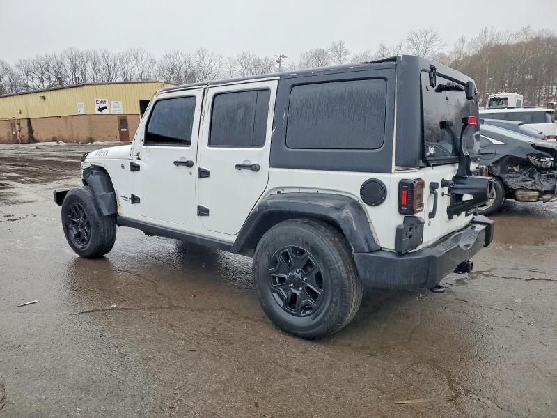 Photo 2 from auction – 2016 JEEP WRANGLER U with VIN 1C4BJWDG9GL263774