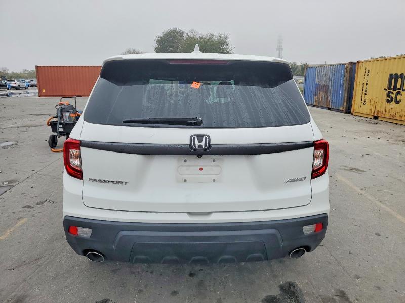 Photo 6 from auction – 2020 HONDA PASSPORT E with VIN 5FNYF8H55LB001358