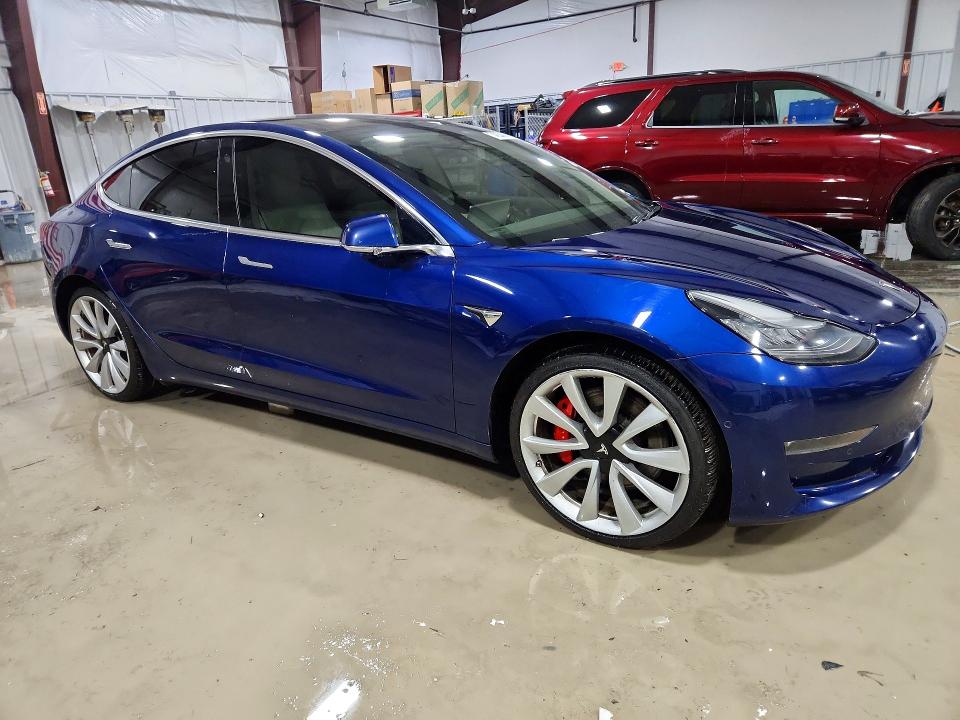 Photo 4 from auction – 2019 TESLA MODEL 3 with VIN 5YJ3E1EB7KF422088