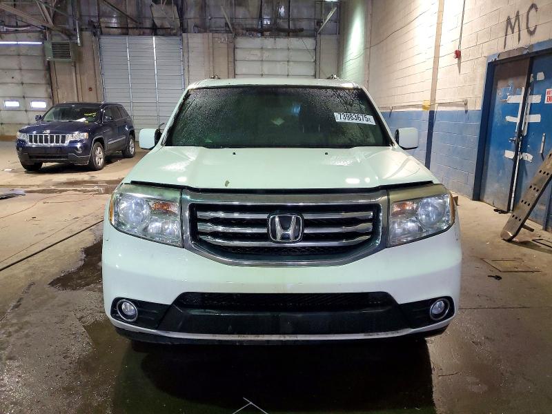 Photo 5 from auction – 2014 HONDA PILOT EX with VIN 5FNYF4H41EB041715