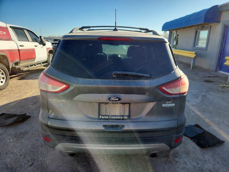 Photo 6 from auction – 2014 FORD ESCAPE with VIN 1FMCU0GX1EUD72768