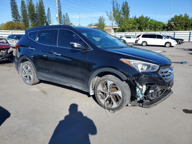 Photo 4 from auction – 2018 HYUNDAI SANTA FE SPORT with VIN 5NMZU3LBXJH102403