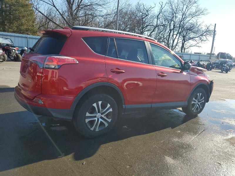 Photo 3 from auction – 2016 TOYOTA RAV4 LE with VIN JTMBFREV9GJ054630