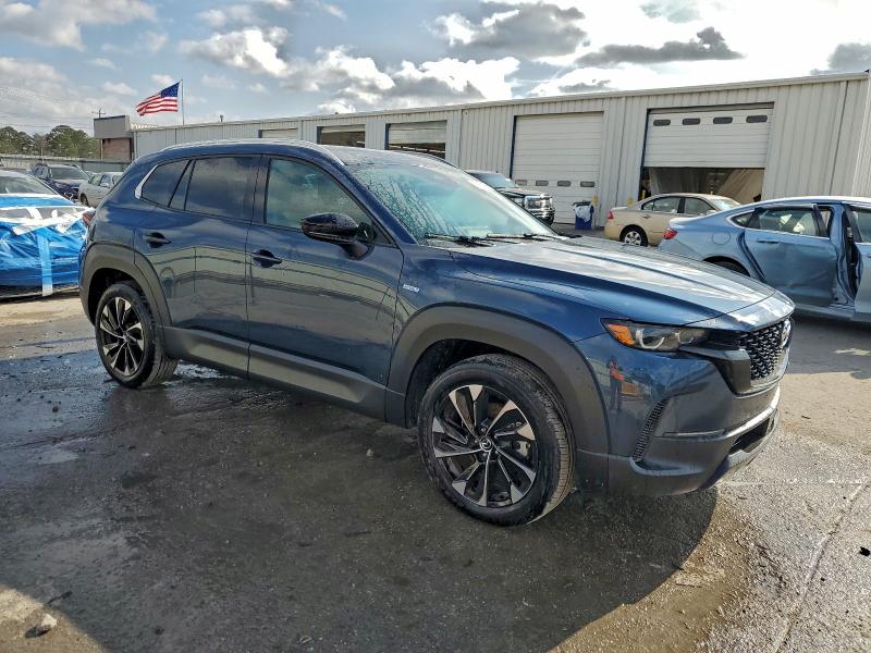 Photo 4 from auction – 2025 MAZDA CX-50 PREM with VIN 7MMVAAEW3SN137378