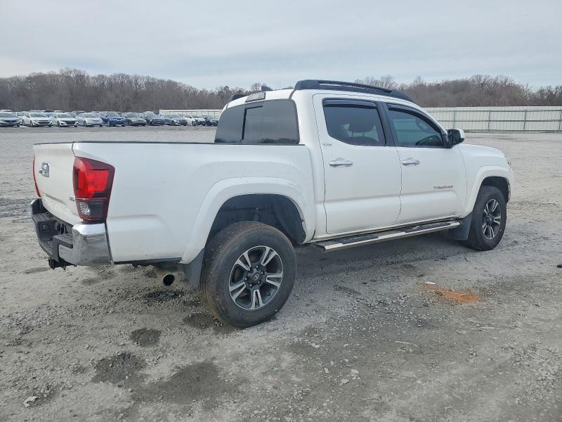 Photo 3 from auction – 2018 TOYOTA TACOMA with VIN 3TMAZ5CN2JM071200