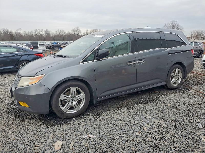HONDA ODYSSEY 2011 مع رقم تعريف المركبة 5FNRL5H99BB044842 - صورة من المزاد
