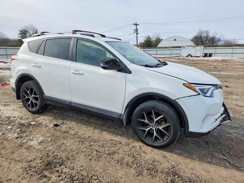 Photo 4 from auction – 2018 TOYOTA RAV4 SE with VIN JTMJFREV2JJ223843