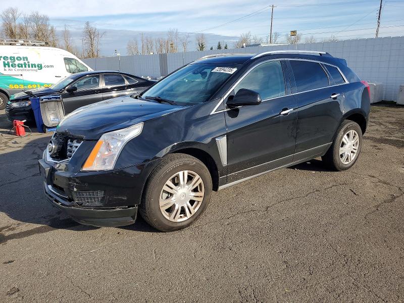 CADILLAC SRX LUXURY 2015 with VIN 3GYFNBE37FS557462 - Photo from auction