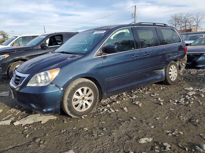 HONDA ODYSSEY 2010 with VIN 5FNRL3H46AB057667 - Photo from auction