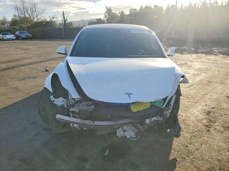 Photo 5 from auction – 2021 TESLA MODEL 3 with VIN 5YJ3E1EB2MF055247