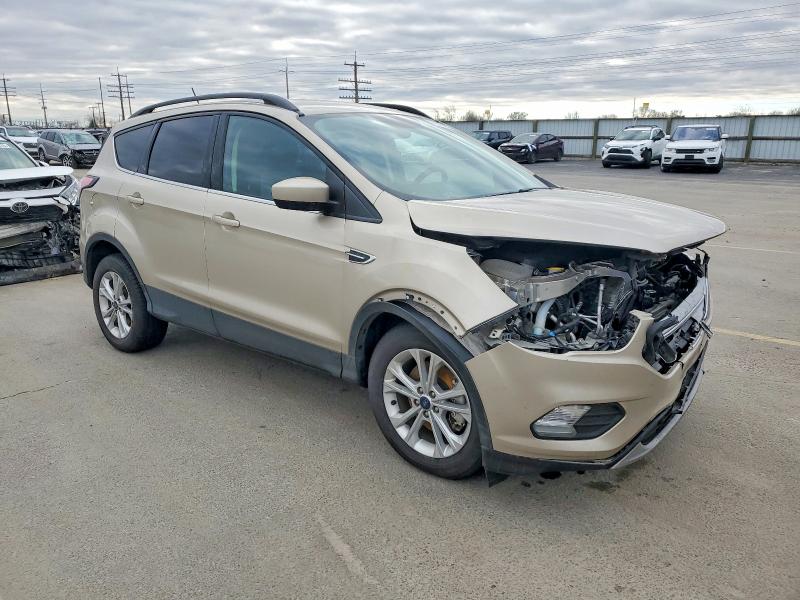 Photo 4 from auction – 2018 FORD ESCAPE with VIN 1FMCU9GD9JUB25471