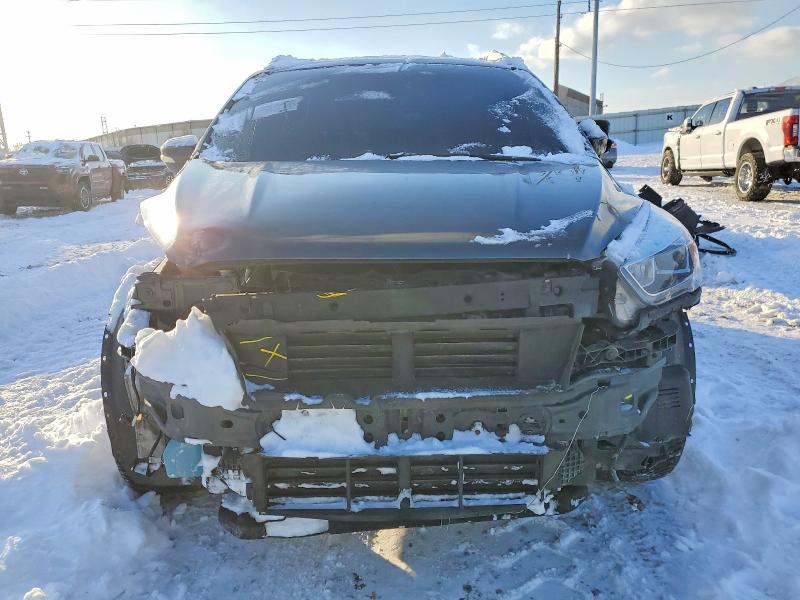 Photo 5 from auction – 2017 FORD ESCAPE TIT with VIN 1FMCU9J90HUB15054