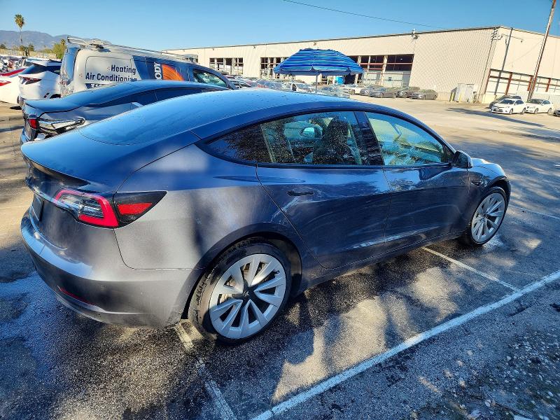 Photo 3 from auction – 2023 TESLA MODEL 3 with VIN 5YJ3E1EAXPF458372