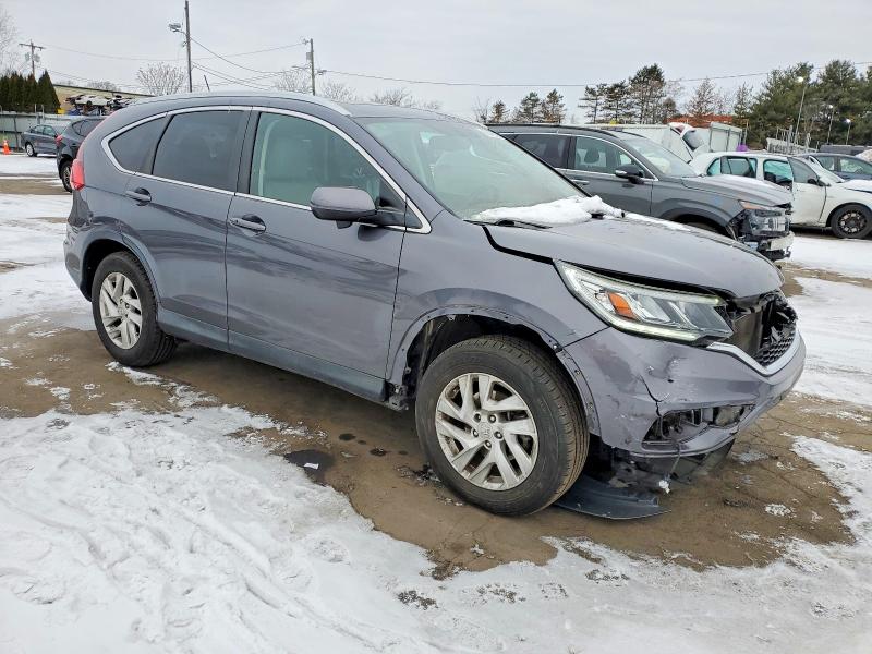 Photo 4 from auction – 2016 HONDA CR-V EXL with VIN 2HKRM4H70GH669189