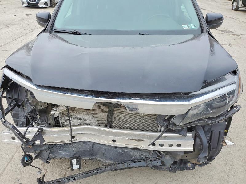 Photo 12 from auction – 2021 HONDA PILOT EXL with VIN 5FNYF6H55MB069830