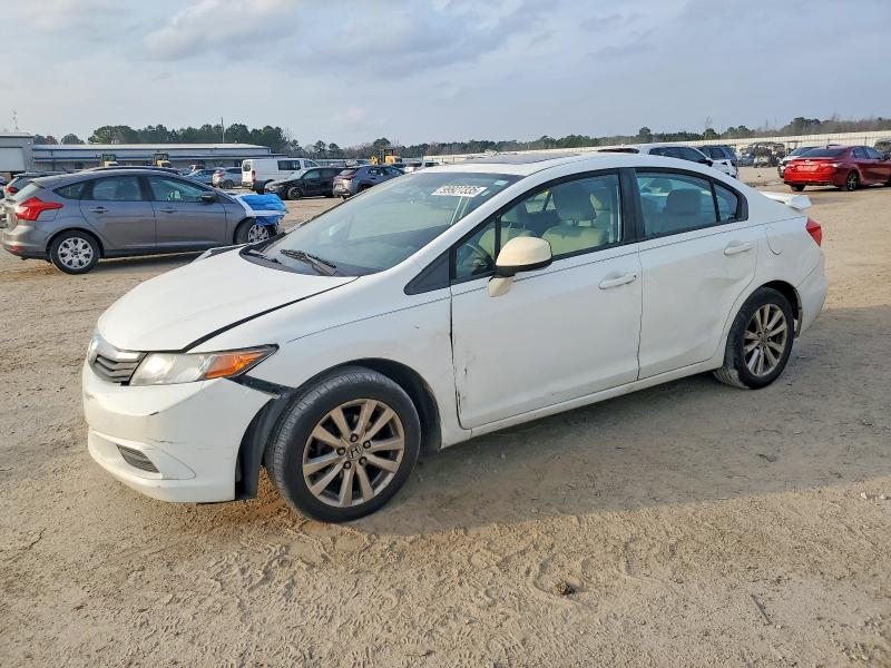 HONDA CIVIC 2012 with VIN 19XFB2F8XCE303571 - Photo from auction
