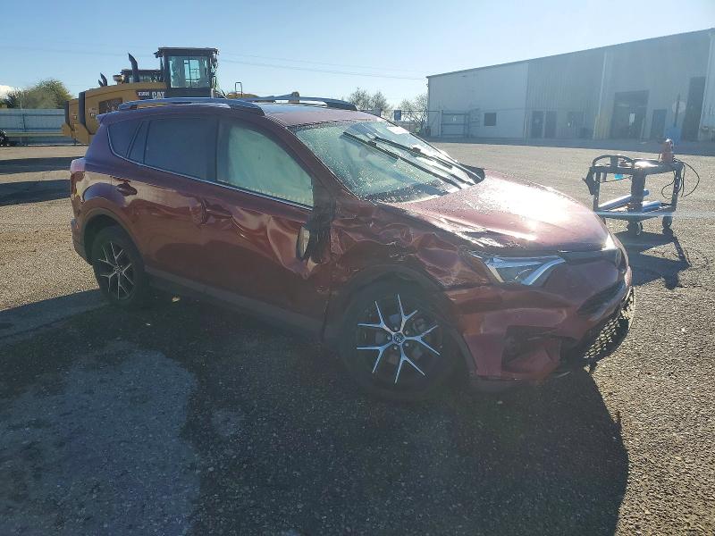 Photo 4 from auction – 2018 TOYOTA RAV4 SE with VIN JTMNFREV0JD123529