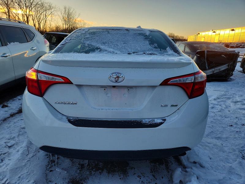 Photo 6 from auction – 2014 TOYOTA COROLLA EC with VIN 5YFBPRHE8EP069606