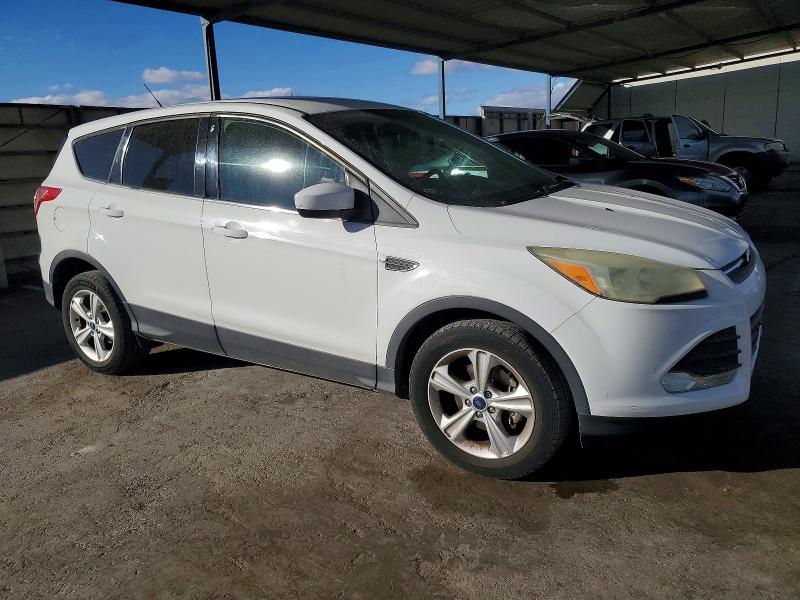 Foto 4 de la subasta – 2014 FORD ESCAPE con VIN 1FMCU0GX7EUB15968