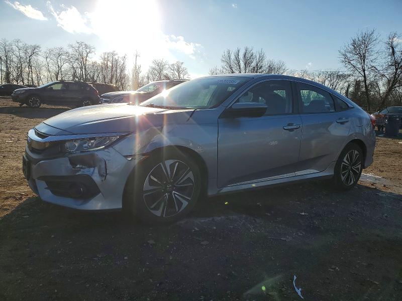 HONDA CIVIC 2016 with VIN 19XFC1F38GE035623 - Photo from auction