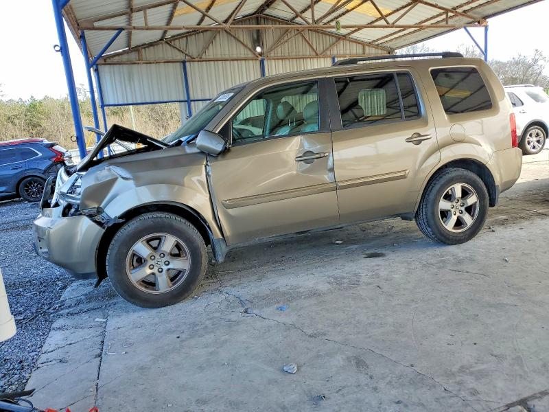 HONDA PILOT EXL 2011 with VIN 5FNYF3H62BB041584 - Photo from auction