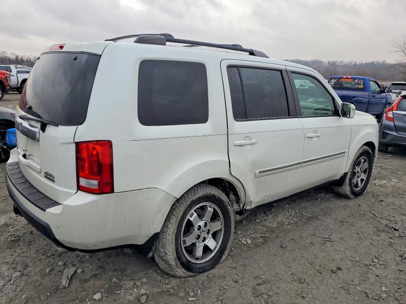Photo 3 from auction – 2011 HONDA PILOT TOUR with VIN 5FNYF4H91BB018362