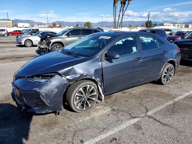 TOYOTA COROLLA L 2017 with VIN 5YFBURHE4HP586883 - Photo from auction