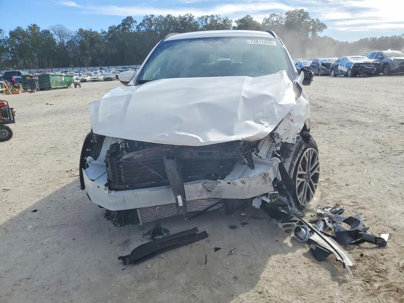 Photo 5 from auction – 2020 FORD ESCAPE SEL with VIN 1FMCU0H64LUA69518