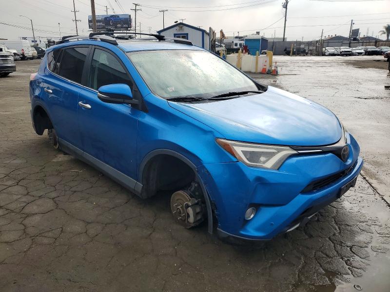 Photo 4 from auction – 2018 TOYOTA RAV4 with VIN 2T3YFREV9JW470244
