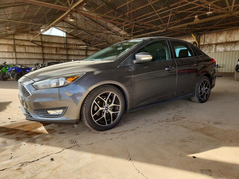 FORD FOCUS SEL 2017 with VIN 1FADP3H28HL228915 - Photo from auction