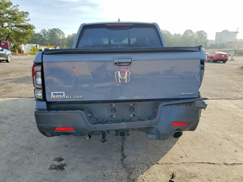 Photo 6 from auction – 2023 HONDA RIDGELINE with VIN 5FPYK3F54PB011541