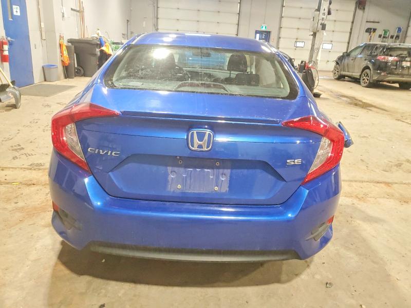 Photo 6 from auction – 2018 HONDA CIVIC with VIN 2HGFC2F64JH041450