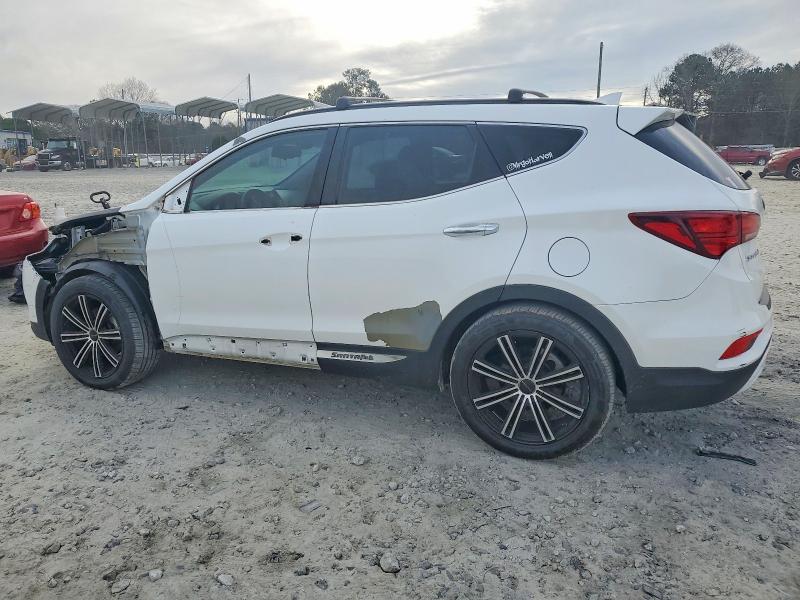 Photo 2 from auction – 2017 HYUNDAI SANTA FE S with VIN 5NMZU3LBXHH028846