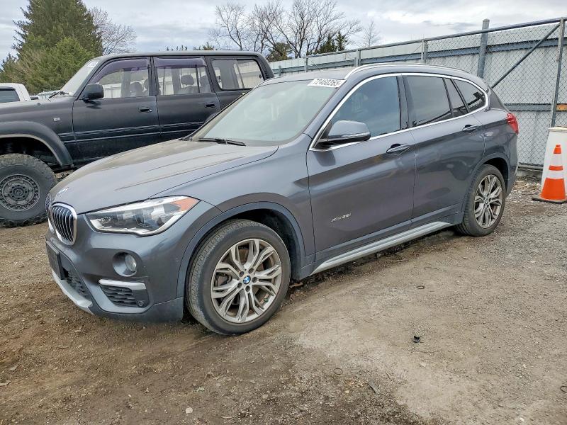 BMW X1 XDRIVE2 2017 with VIN WBXHT3Z35H4A57300 - Photo from auction