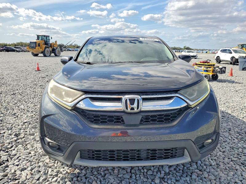 Photo 5 from auction – 2017 HONDA CR-V with VIN 7FARW1H8XHE014298