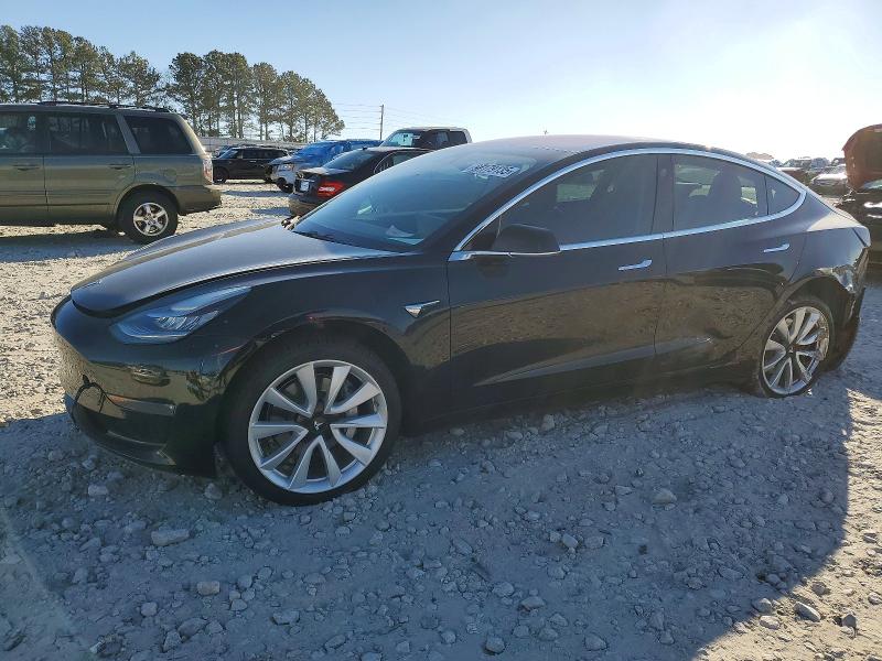 TESLA MODEL 3 2018 with VIN 5YJ3E1EA1JF001666 - Photo from auction