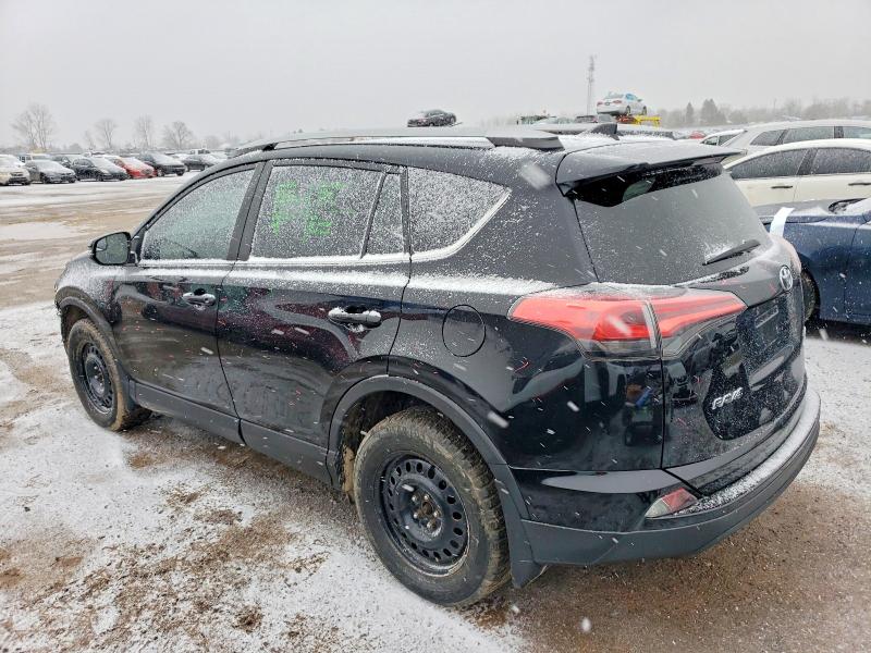 Photo 2 from auction – 2017 TOYOTA RAV4 LE with VIN 2T3BFREV4HW610894