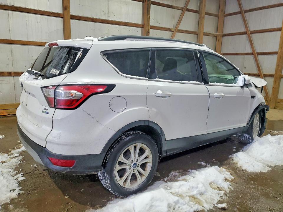 Photo 3 from auction – 2018 FORD ESCAPE with VIN 1FMCU9GD5JUD36232