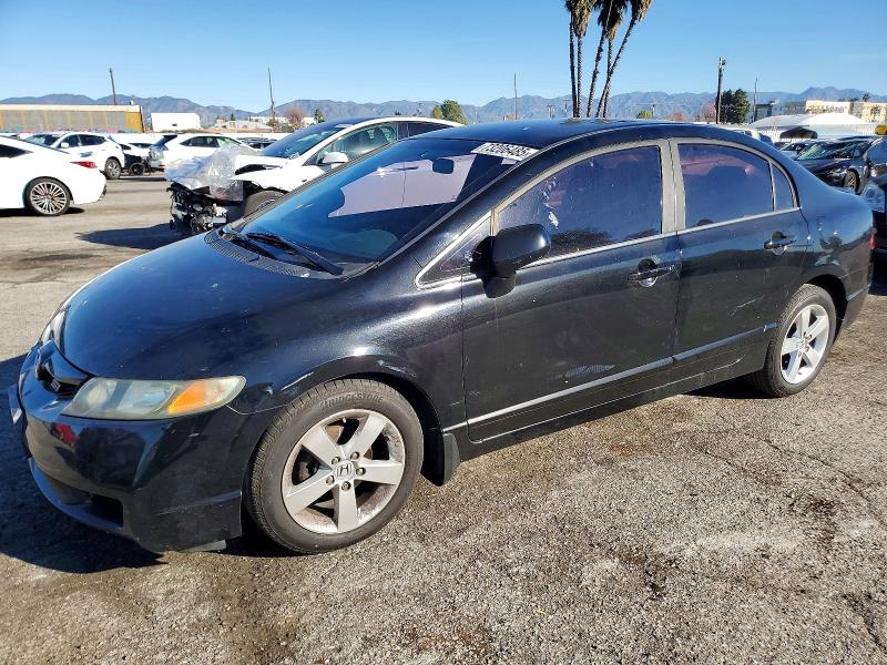 Photo 1 from auction – 2011 HONDA CIVIC LX-S with VIN 19XFA1F69BE004020