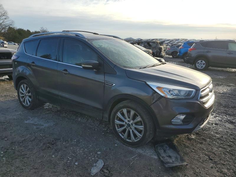 Photo 4 from auction – 2017 FORD ESCAPE TIT with VIN 1FMCU0J94HUE25963